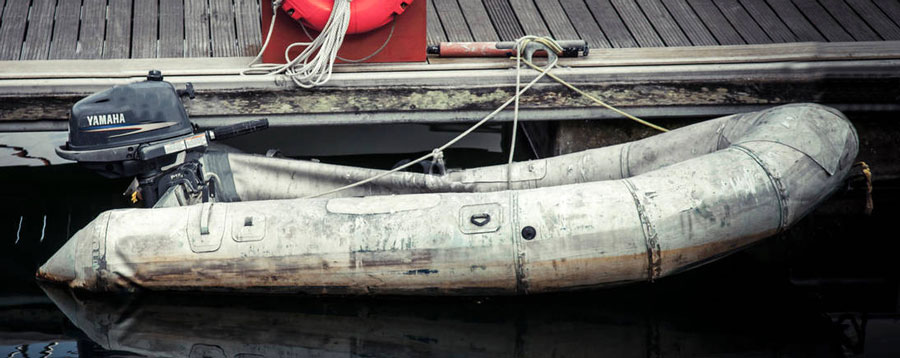 Neglected Damaged Inflatable Boat